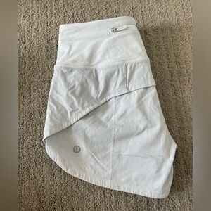 White, size 2, high waist, 4 inch, “speed up” lululemon shorts.